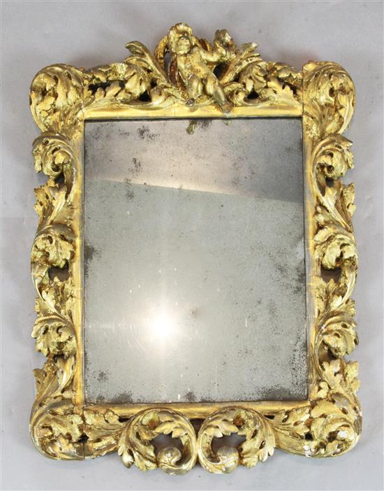 A late 17th century Italian carved giltwood frame wall mirror, W.1ft 10in. H.2ft 4in.